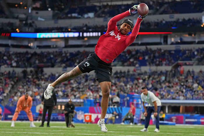 Mar 4, 2023; Indianapolis, IN, USA; North Carolina wide receiver Josh Downs (WO14) participates in drills at Lucas Oil Stadium. s